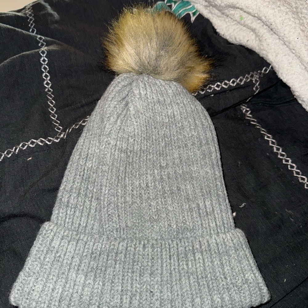 Grey beanie with Pom